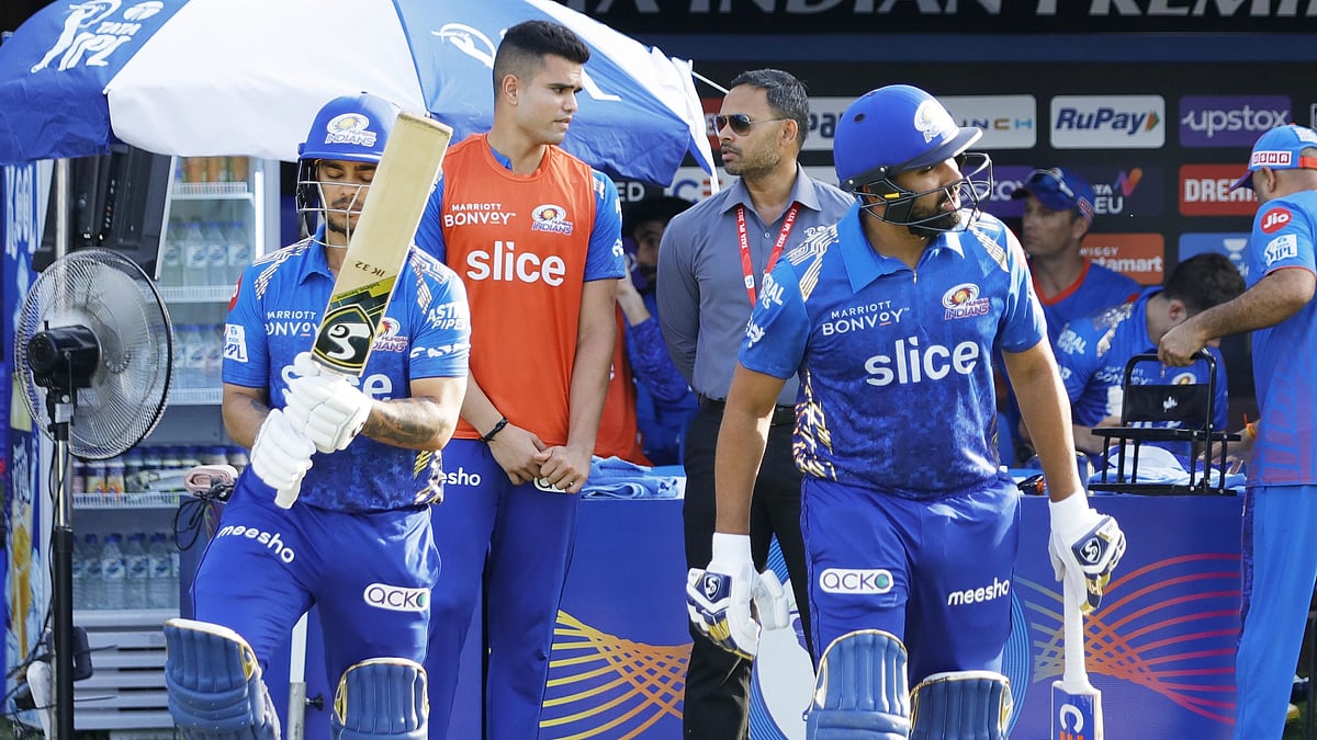 <div class="paragraphs"><p>Rohit Sharma and Ishan Kishan walk out to bat.</p></div>