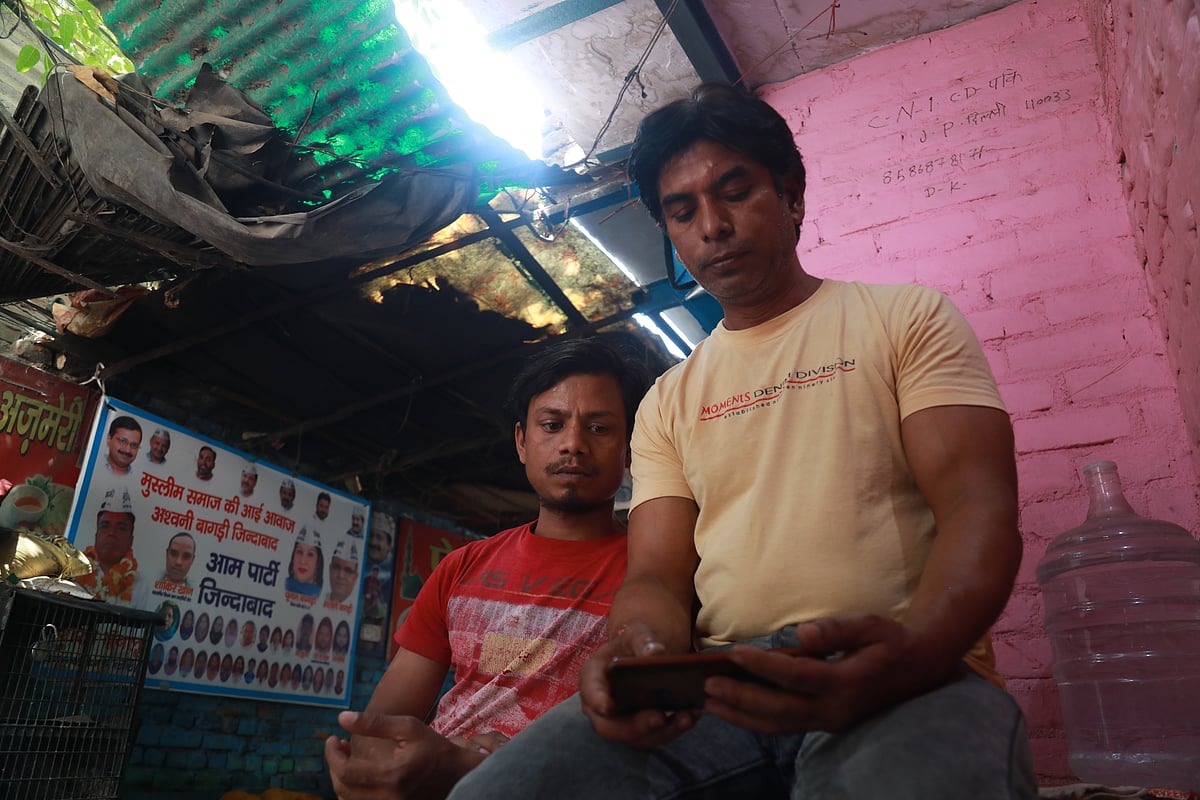 <div class="paragraphs"><p>Dileep Kumar and Mohammad Mustaqeem watching a news channel.&nbsp;</p></div>