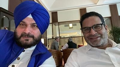 <div class="paragraphs"><p>Former Punjab Congress President Navjot Singh Sidhu with Prashant Kishor </p></div>