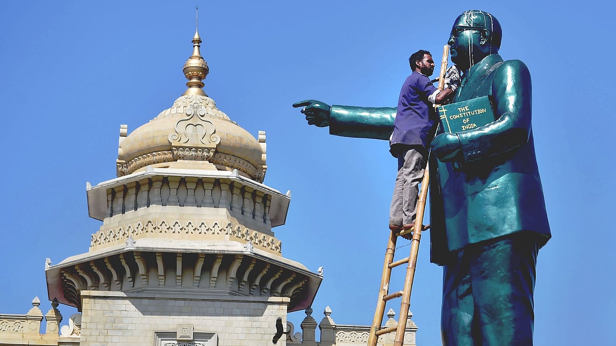 <div class="paragraphs"><p>Ambedkar Jayanti: A file photo of a worker cleaning a statue of Babasaheb Ambedkar at Vidhanasoudha in Bengaluru. Photo for representation. </p></div>