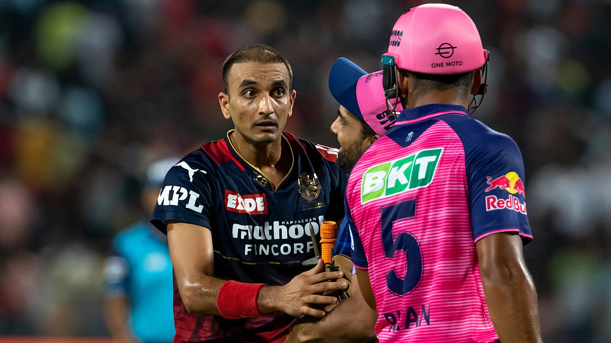 <div class="paragraphs"><p>Riyan Parag and Harshal Patel exchange words</p></div>