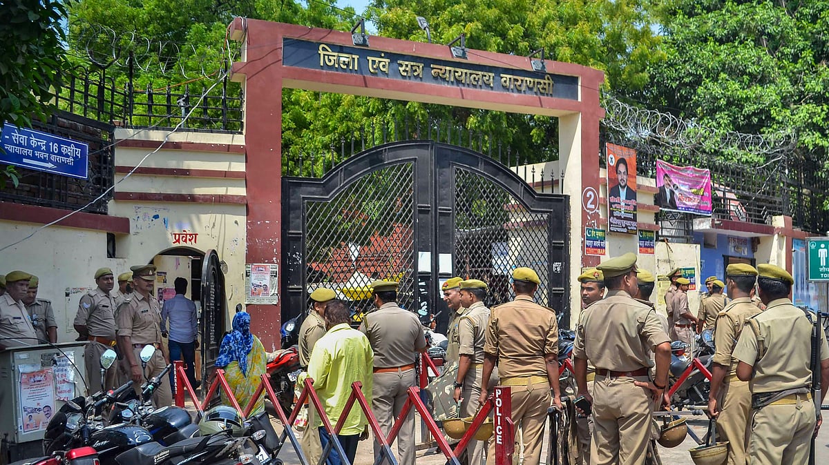 <div class="paragraphs"><p>Police personnel stand guard during the hearing of the Gyanvapi mosque-Shringar Gauri temple case, outside the Varanasi District Court.&nbsp;</p></div>