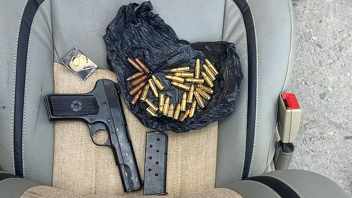 <div class="paragraphs"><p>Desi pistol, 31 live ammunition rounds, three iron containers with explosives and nearly Rs 1.3 lakh have been recovered.</p></div>