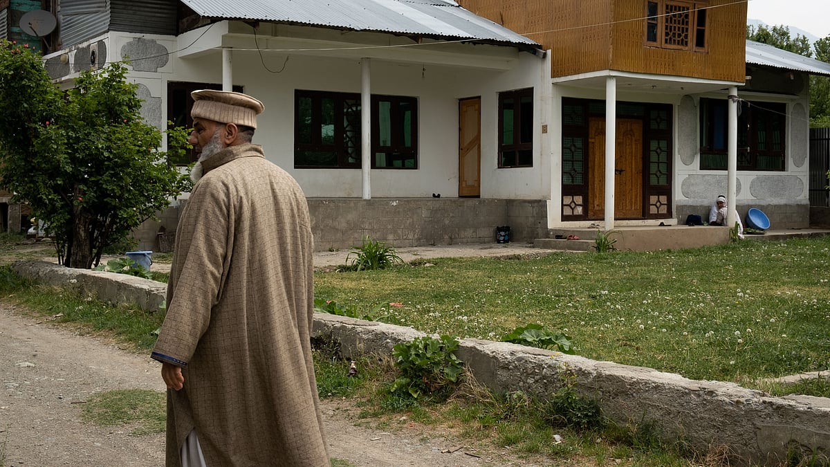 <div class="paragraphs"><p>Haji Mohammad Sharif, head of J&K’s Pashtun community, taking a stroll outside his home. </p></div>