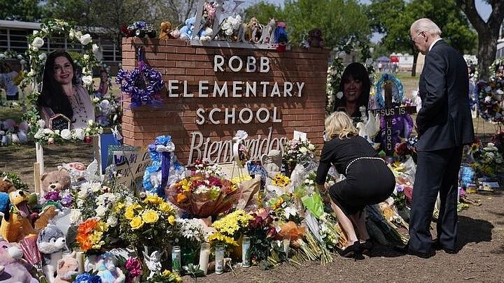 <div class="paragraphs"><p>United States President <a href="https://www.thequint.com/news/world/texas-school-shooting-reactions-joe-biden-kamala-harris">Joe Biden</a> and First Lady Jill Biden pay their respects. </p></div>