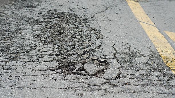 <div class="paragraphs"><p>A road in Bengaluru has started to peel days after it was fixed for PM Modi's visit. (The image is representational)</p></div>