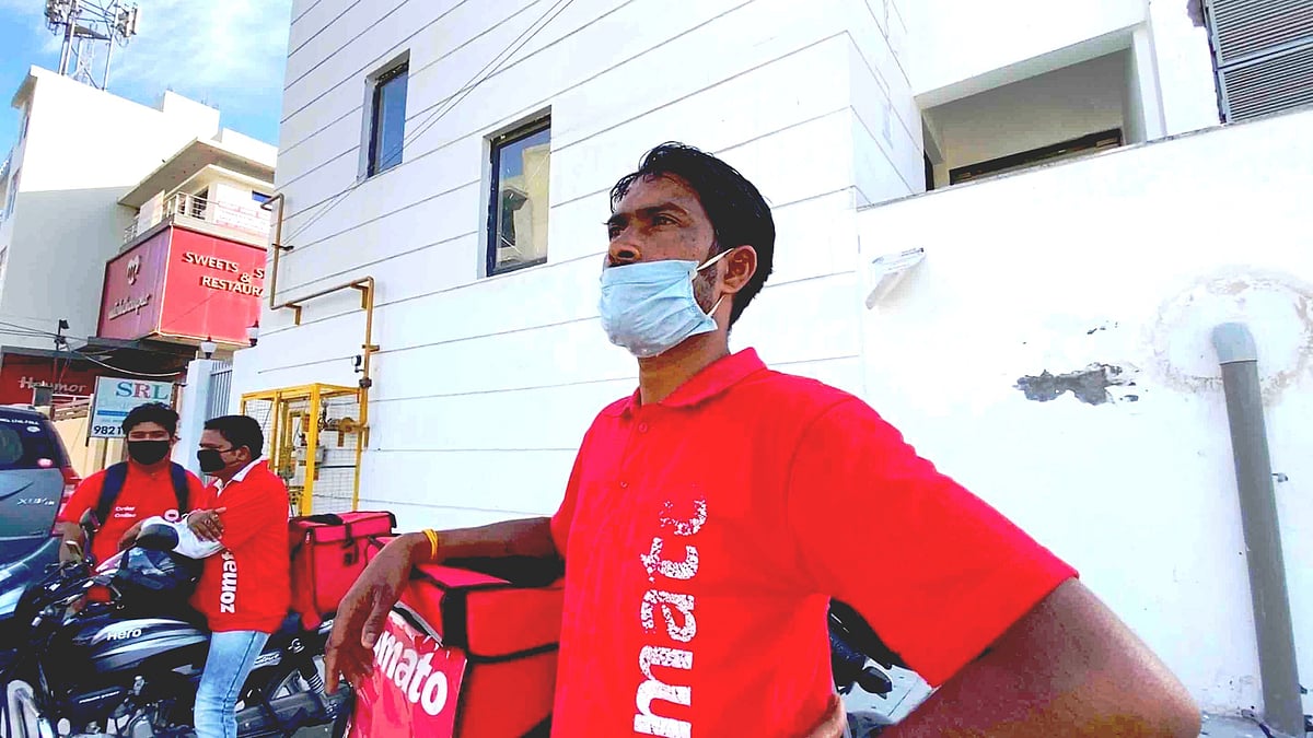 <div class="paragraphs"><p>Raju Das, who works with Zomato, waiting at Sector 104, Noida. </p></div>