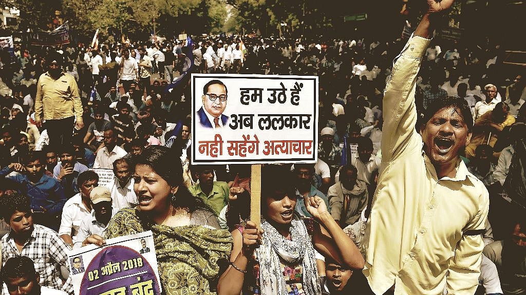 <div class="paragraphs"><p>Members of the Dalit community raise slogans during Bharat Bandh against the alleged dilution of SC/ST Act in New Delhi, on 2 April 2018. Image used for representation.</p></div>