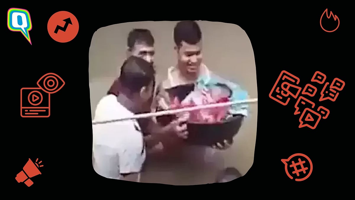 <div class="paragraphs"><p>Assam Floods Viral Video: Overjoyed father carries his newborn baby through chest-high flood water in Silchar, Assam.</p></div>