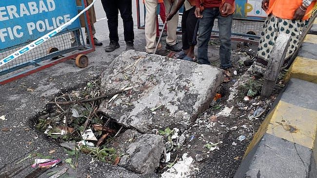 <div class="paragraphs"><p>The manhole around which Mohammed Zahed was trying to re-erect the barricade.</p></div>