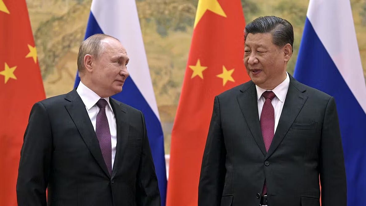 <div class="paragraphs"><p>Vladimir Putin, left, and Xi Jinping. </p></div>