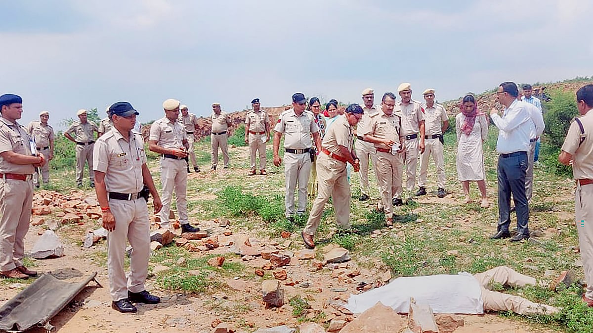 <div class="paragraphs"><p>Police personnel at the crime scene after DSP Surender Singh Bishnoi was allegedly mowed to death by the mining mafia at Pachgaon in Haryana's Nuh district on Tuesday, 19 July. </p></div>