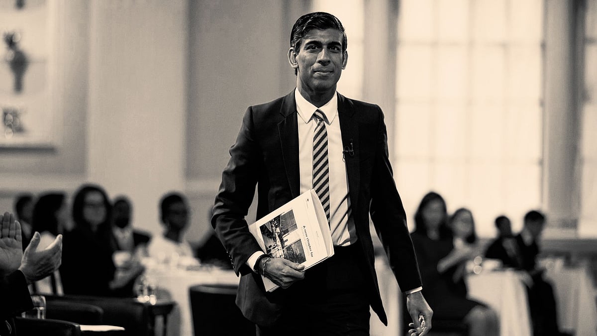 <div class="paragraphs"><p><a href="https://www.thequint.com/us-nri-news/who-is-rishi-sunak-indian-origin-mp-quit-uk-pm-right-hand-man">Rishi Sunak</a>.</p></div>