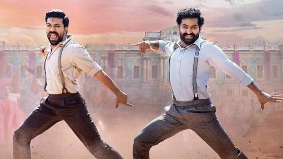 <div class="paragraphs"><p>Ram Charan and Jr NTR in <em>RRR.</em></p></div>