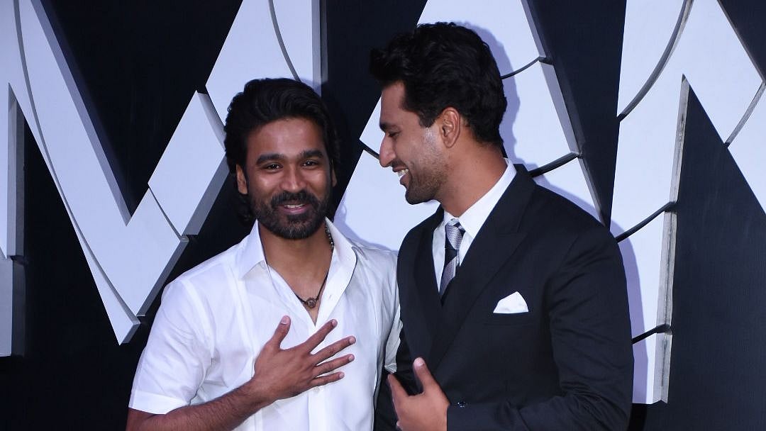 <div class="paragraphs"><p>Dhanush and Vicky Kaushal at <em>The Gray Man </em>premiere.</p></div>