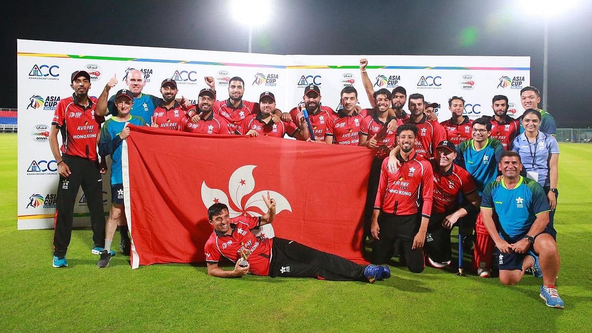 <div class="paragraphs"><p>The Hong Kong team members celebrate after ending the Qualifiers as the top-ranked side and securing a place in the Asia Cup 2022 main event. </p></div>