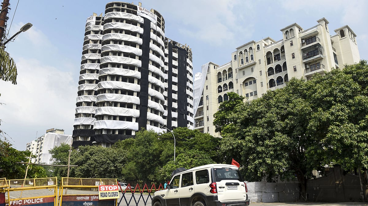 <div class="paragraphs"><p>Noida: Barricades used to block a road leading to the Supertech twin towers ahead of their demolition in compliance with a Supreme Court order, in Noida, on Friday, 26 August 2022.</p></div>