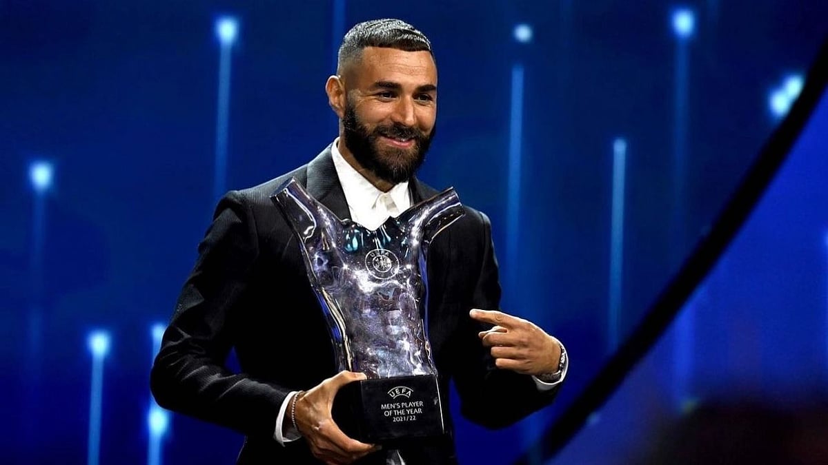 <div class="paragraphs"><p>Real Madrid forward Karim Benzema poses for a photo after winning the 2021-22 UEFA Men's Player of the Year award. </p></div>