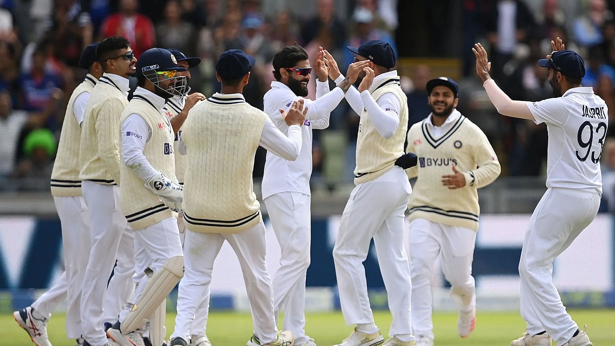 <div class="paragraphs"><p>Indian men's cricket team members celebrate after winning a Test match.</p></div>