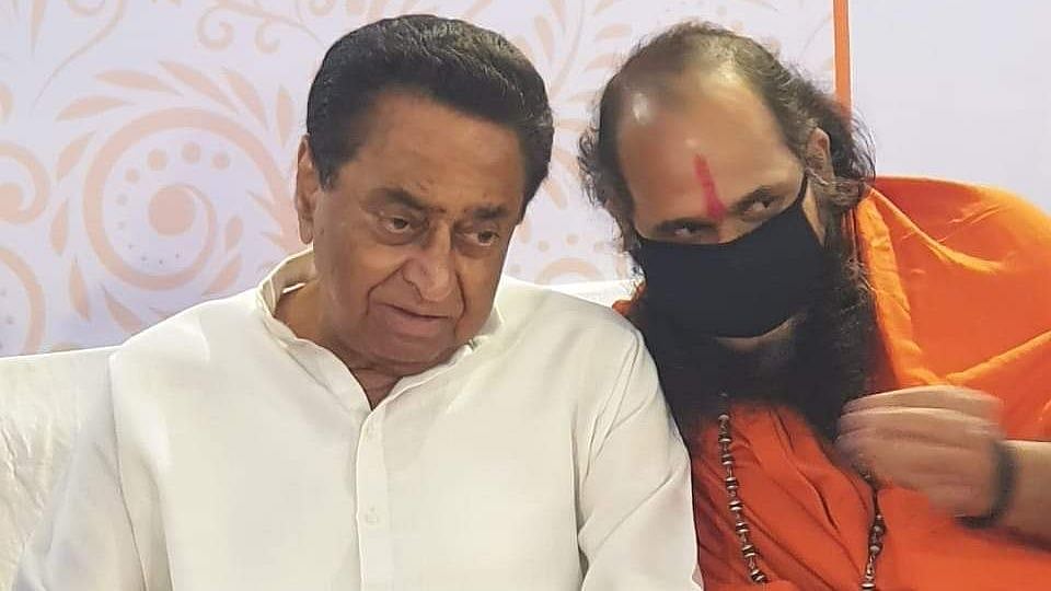 <div class="paragraphs"><p>Self-proclaimed saint Mirchi Baba (right)&nbsp;with former Madhya Pradesh CM Kamal Nath.</p></div>