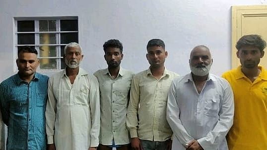 <div class="paragraphs"><p>Photo of the arrested accused.</p></div>