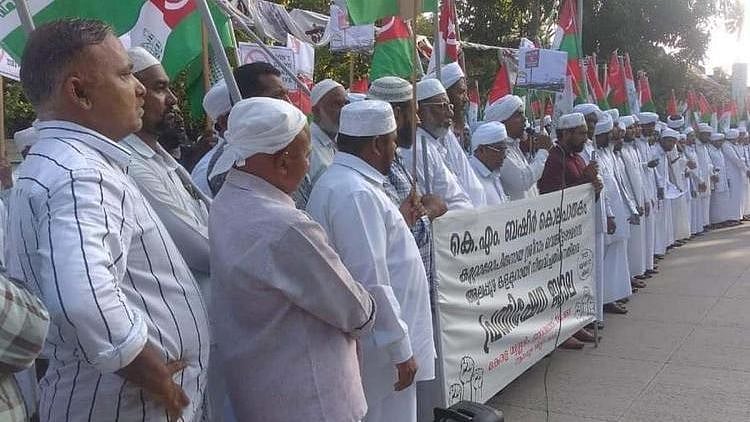 <div class="paragraphs"><p>The protest by Muslim groups against the IAS officer was given a communal spin despite the fact that many other groups were aggrieved over his appointment as Alappuzha district collector.</p></div>