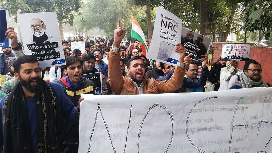 <div class="paragraphs"><p>Atikur Rahman (centre) was also active in the anti-CAA protests.&nbsp;</p></div>