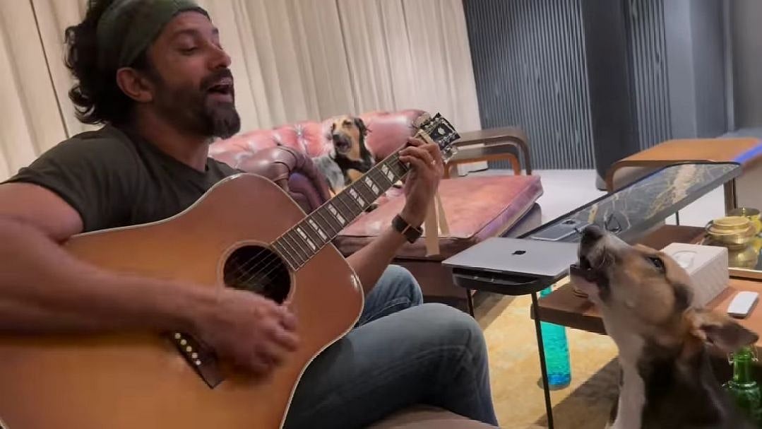 <div class="paragraphs"><p>Farhan Akhtar uploads a cute video of himself singing with his dogs.</p></div>