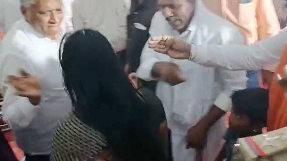 <div class="paragraphs"><p>The woman had confronted the minister about not receiving a land title.</p></div>