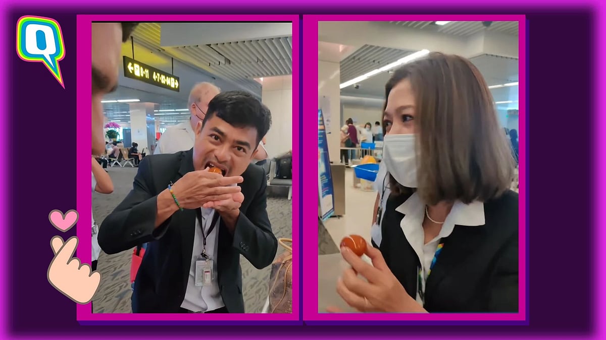<div class="paragraphs"><p>Indian passenger distributes Gulab Jamuns at Phuket airport after being restricted from carrying it on board. </p></div>