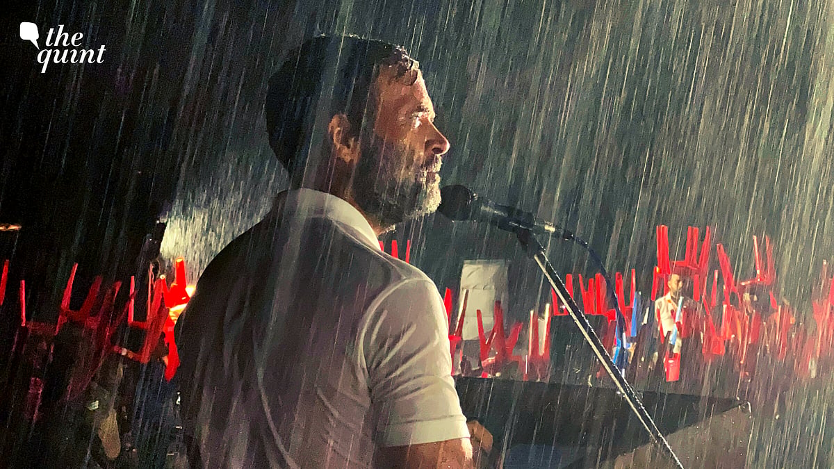 <div class="paragraphs"><p>Congress leader Rahul Gandhi braving heavy rain while addressing a rally in Karnataka's Mysuru.</p></div>