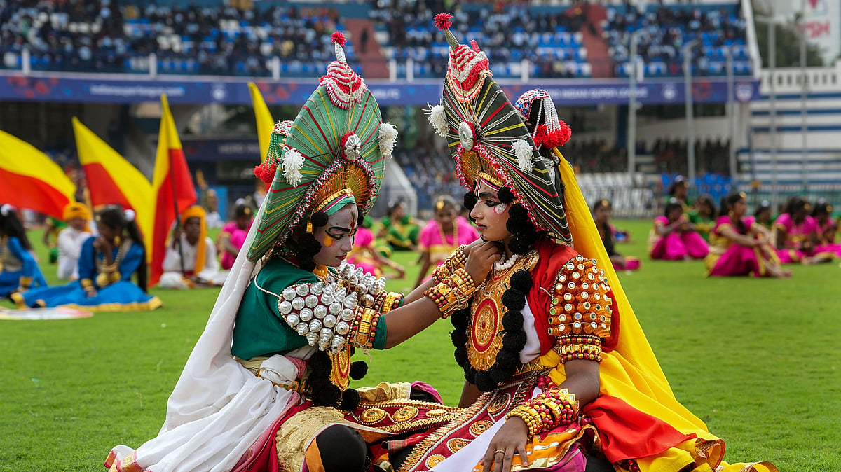 <div class="paragraphs"><p>Students dressed in Yakshagana theatre costume during the 67th Kannada Rajyotsava celebration at Kanteerava stadium in Bengaluru, Tuesday, 1 November.</p></div>