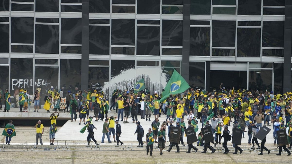 <div class="paragraphs"><p>Protesters, supporters of Brazils former President Jair Bolsonaro, storm the Supreme Court building in Brasilia, Brazil.</p></div>