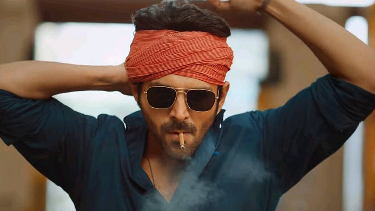<div class="paragraphs"><p>Kartik Aaryan in a still from <em>Shehzada</em>.</p></div>