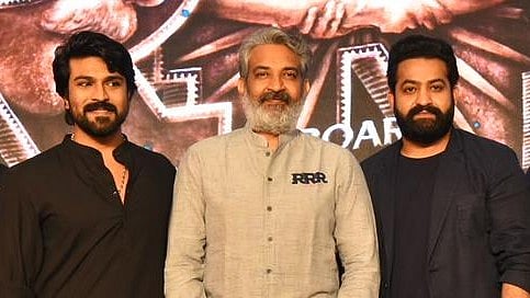 <div class="paragraphs"><p>SS Rajamouli with Jr NTR and Ram Charan.</p></div>