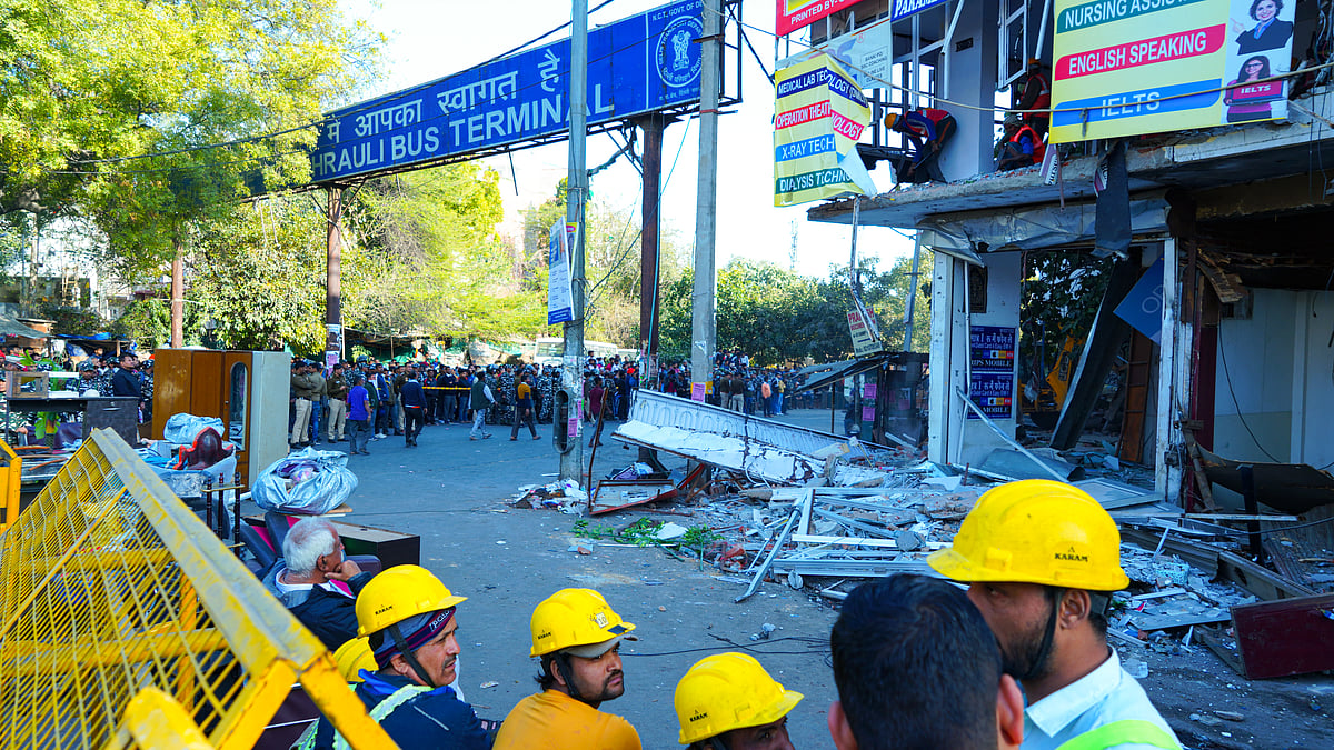 <div class="paragraphs"><p>The ruckus amidst the demolition drive at the Mehrauli&nbsp;Bus Terminal. Despite the Delhi Development Authority (DDA) and police personnel facing protests from many local residents,&nbsp;an "anti-encroachment drive" in the Mehrauli Archaeological Park area went on for the fourth consecutive day on Monday, 13 February.&nbsp;</p></div>