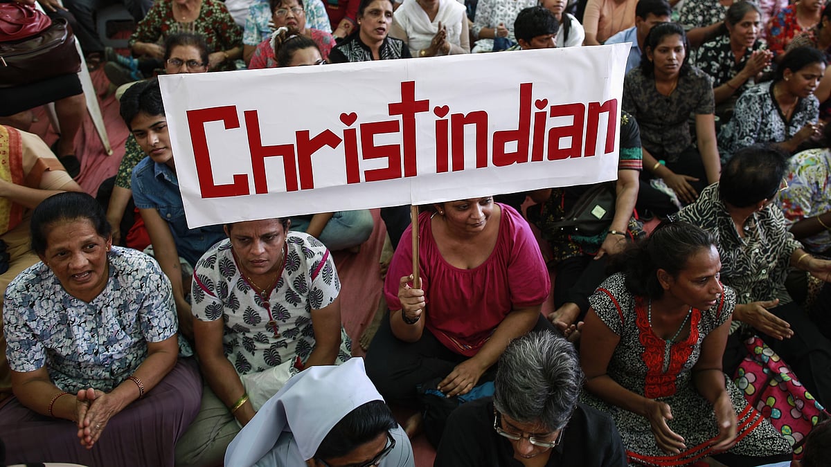 <div class="paragraphs"><p>Christians protesting against the recent attacks on churches.</p></div>