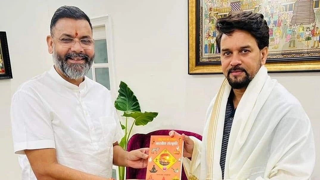 <div class="paragraphs"><p>A photo of Sanjay Rai with Union Minister Anurag Thakur. </p></div>