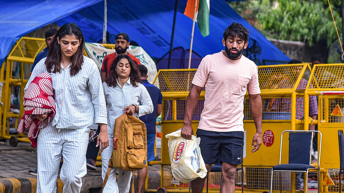 <div class="paragraphs"><p>Bajrang Punia and Vinesh Phogat at the protest site.</p></div>