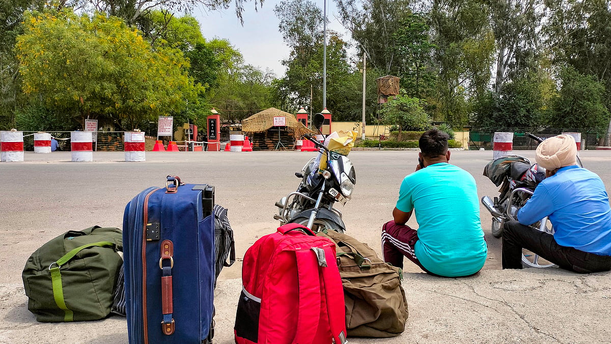 <div class="paragraphs"><p>Soldiers, who returned after leave, wait outside the Bathinda military station after a firing incident took place, in Bathinda, on Wednesday morning, 12 April. Four people were killed in the incident Wednesday, the Army said.</p></div>