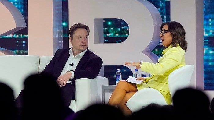 <div class="paragraphs"><p>Elon Musk and Linda Yaccarino. </p></div>