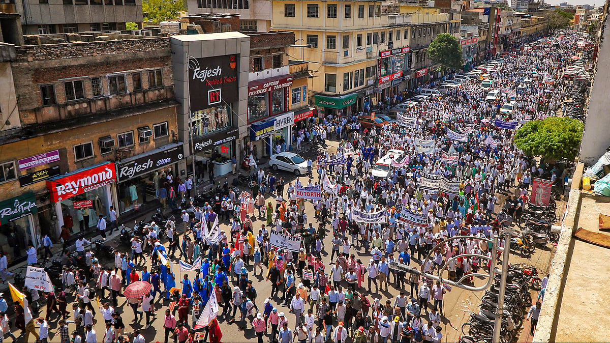 <div class="paragraphs"><p>Doctors take part in a protest rally against Rajasthans Right to Health bill, at MI Road in Jaipur, on Tuesday, 4 April.</p></div>