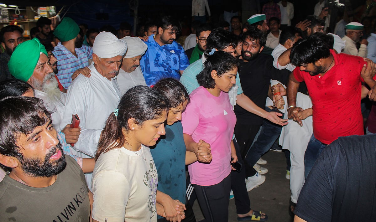 <div class="paragraphs"><p>Haridwar: Protesting wrestlers Bajrang Punia, Sakshi Malik, Vinesh Phogat and Sangeeta Phogat at Har ki Pauri ghat, in Haridwar, Tuesday, May 30, 2023.</p></div>