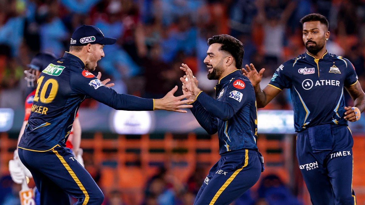 <div class="paragraphs"><p>Noor Ahmad and Rashid Khan of Gujarat Titans celebrates a wicket during IPL 2023. </p></div>
