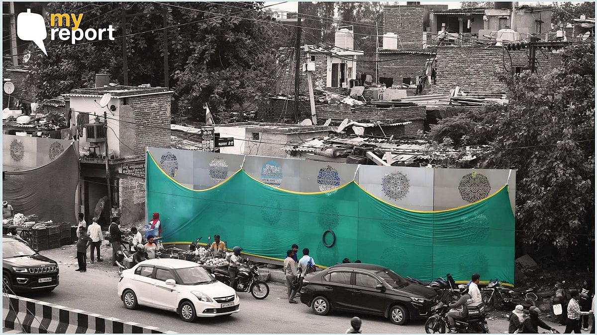 <div class="paragraphs"><p>Jhuggis at Sector 16 in Noida is being covered by the tin shade.</p></div>