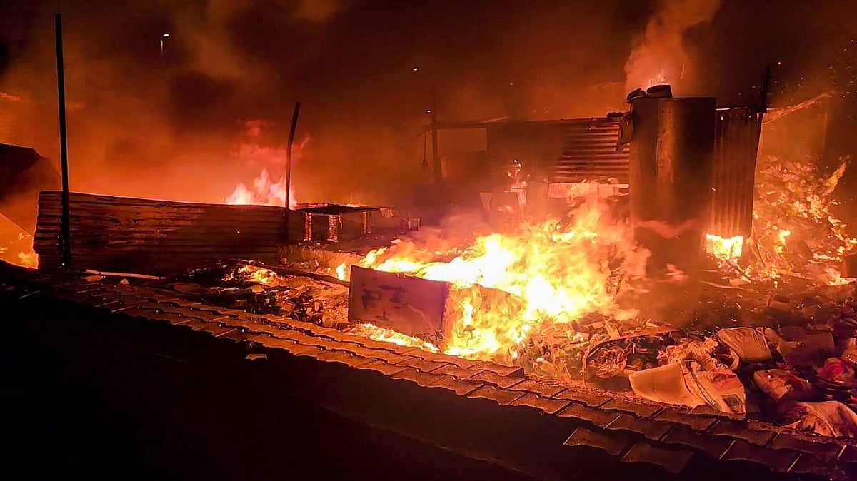 <div class="paragraphs"><p>Flames rise from shops and other structures set ablaze by miscreants during fresh violence after Monday's attack on a procession in adjoining Nuh district, at Badshahpur area in Gurugram on Tuesday night, &nbsp;1 August.</p></div>