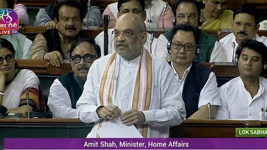 <div class="paragraphs"><p>Home Minister Amit Shah addressing the Lok Sabha on Wednesday, 9 August. </p></div>
