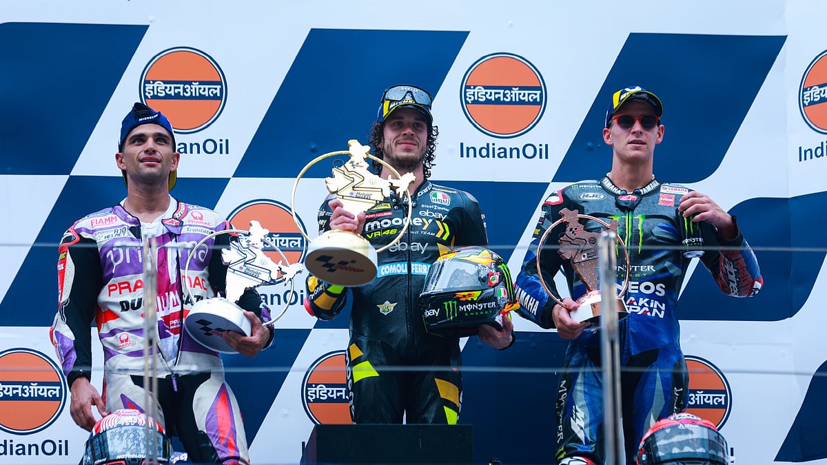 <div class="paragraphs"><p>Marco Bezzecchi (centre) along with Jorge Martin (left) and Fabio Quartararo (right) with their trophies of maiden MotoGP Bharat. </p></div>