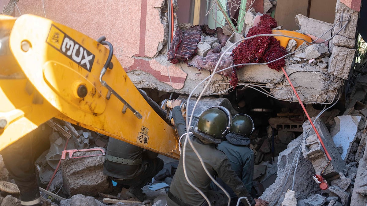 <div class="paragraphs"><p>Security forces take part in a rescue operation after an earthquake, in Moulay Ibrahim village, near Marrakech, Morocco, on Saturday, 9 September. </p></div>