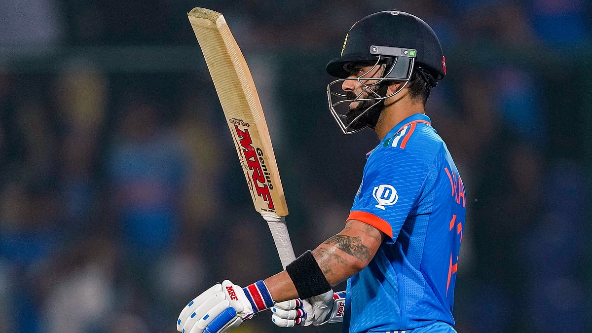 <div class="paragraphs"><p>India's Virat Kohli celebrates his fifty in the ICC Mens Cricket World Cup 2023 match between India and Afghanistan, at Arun Jaitley Stadium, in New Delhi, Wednesday, Oct. 11, 2023.</p></div>
